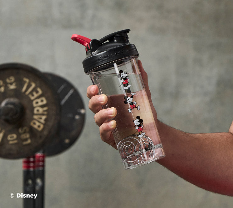 pro-series-n0 Mickey_Mouse_Protein_Shaker_Bottle_Being_Held_In_the_Gym.jpg